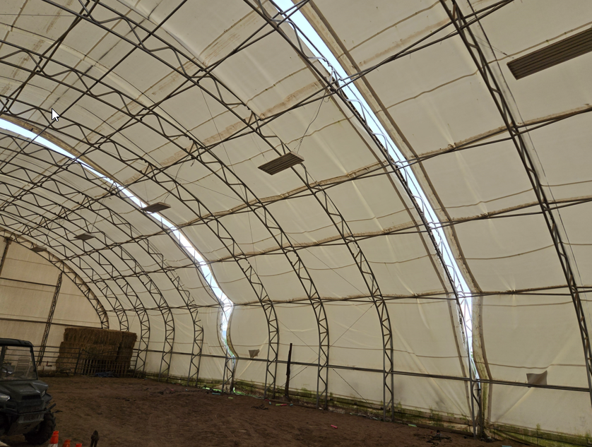 Roof sections held by cables